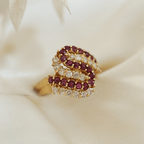 Yellow Gold Swirl Design Round Cut Ruby & White Sapphire Cocktail Band