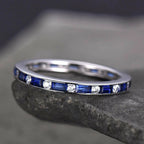 Classic Channel Setting Baguette Cut Blue & White Sapphire Eternity Wedding Band For Women