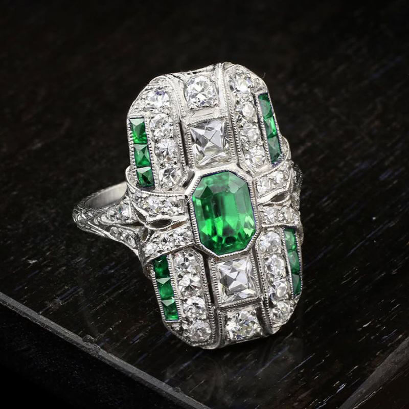 Art Deco Bezel Emerald Cut Emerald Sapphire Halo Engagement Ring