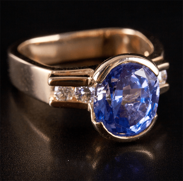 Half Bezel Yellow Gold Oval Cut Blue Sapphire Engagement Ring
