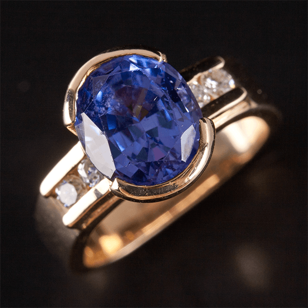 Half Bezel Yellow Gold Oval Cut Blue Sapphire Engagement Ring