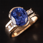 Half Bezel Yellow Gold Oval Cut Blue Sapphire Engagement Ring