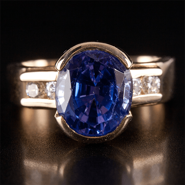 Half Bezel Yellow Gold Oval Cut Blue Sapphire Engagement Ring