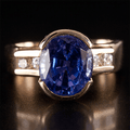 Half Bezel Yellow Gold Oval Cut Blue Sapphire Engagement Ring