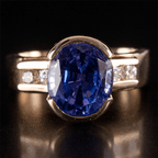 Half Bezel Yellow Gold Oval Cut Blue Sapphire Engagement Ring