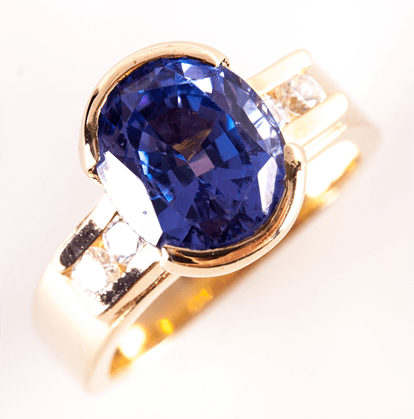 Half Bezel Yellow Gold Oval Cut Blue Sapphire Engagement Ring