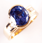 Half Bezel Yellow Gold Oval Cut Blue Sapphire Engagement Ring