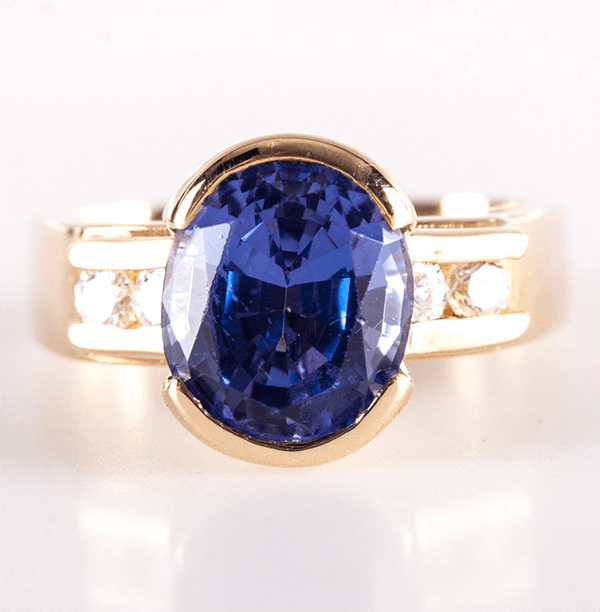 Half Bezel Yellow Gold Oval Cut Blue Sapphire Engagement Ring