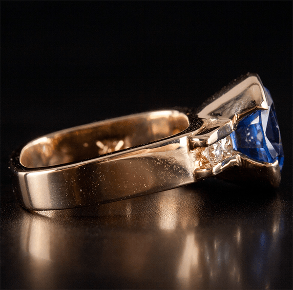 Half Bezel Yellow Gold Oval Cut Blue Sapphire Engagement Ring