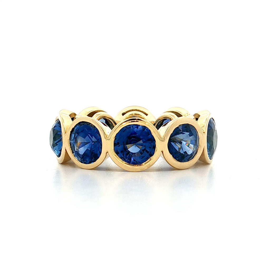 Classic Bezel Eternity Yellow Gold Round Cut Blue Sapphire Wedding Band For Women