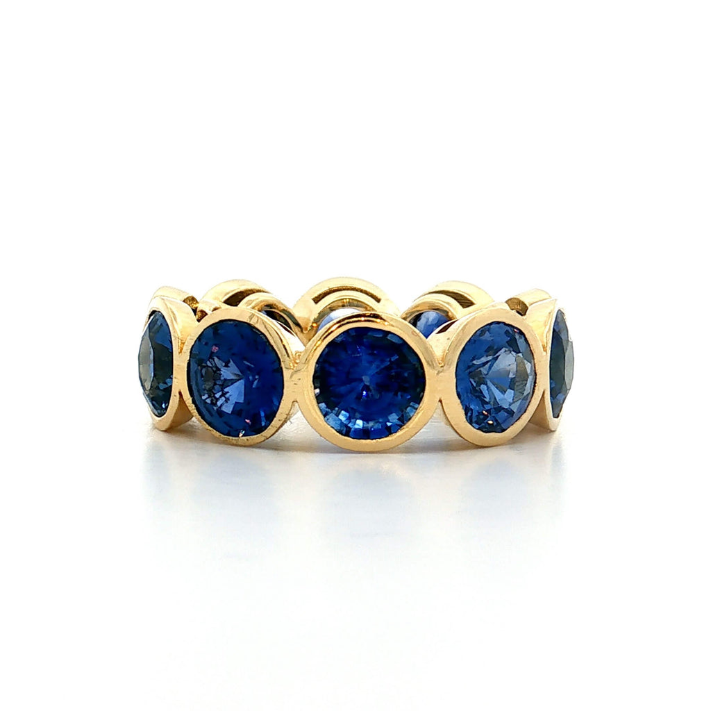 Classic Bezel Eternity Yellow Gold Round Cut Blue Sapphire Wedding Band For Women