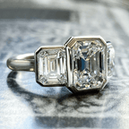 Classic Bezel Three Stone Emerald Cut White Sapphire Engagement Ring