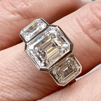 Classic Bezel Three Stone Emerald Cut White Sapphire Engagement Ring
