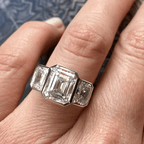 Classic Bezel Three Stone Emerald Cut White Sapphire Engagement Ring