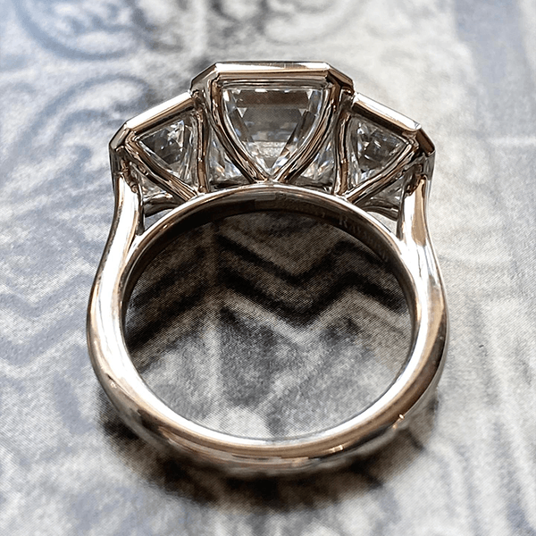 Classic Bezel Three Stone Emerald Cut White Sapphire Engagement Ring