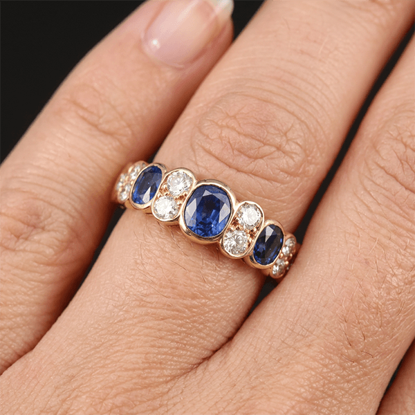 Vintage Yellow Gold Bezel Oval Cut Blue Sapphire Half Eternity Wedding Band For Women