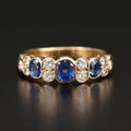 Vintage Yellow Gold Bezel Oval Cut Blue Sapphire Half Eternity Wedding Band For Women
