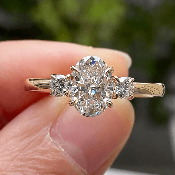 Classic Three Stone Yellow Gold Oval & Round Cut White Sapphire Engagement Ring