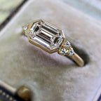 Classic Bezel Yellow Gold Emerald Cut White Sapphire Engagement Ring