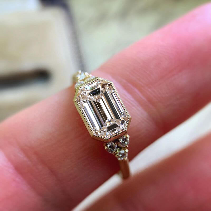 Classic Bezel Yellow Gold Emerald Cut White Sapphire Engagement Ring