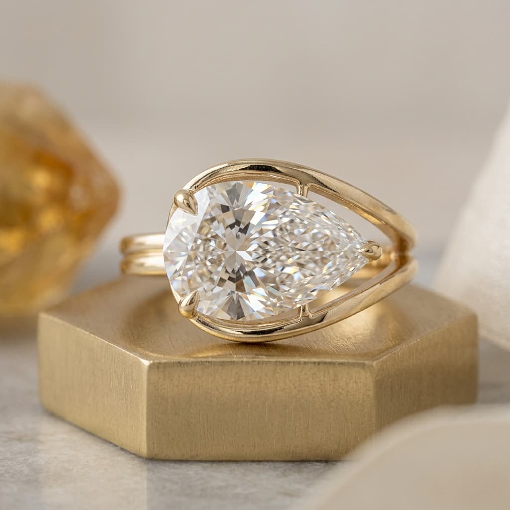 Unique Design Golden Solitaire Split Shank Pear Cut White Sapphire Engagement Rings