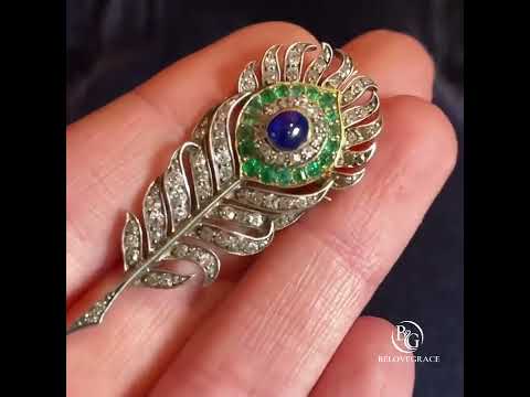 Vintage Two Tone Feather Design Emerald & Blue & White Sapphire Oval Cut Brooch