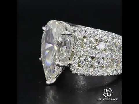 Multi Row Pave Solitaire Pear Cut Moissanite Engagement Ring