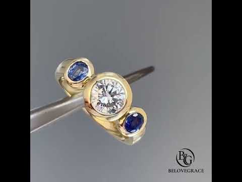 Bezel Set Three-Stone Round & Oval Cut White & Blue Sapphire Engagement Ring